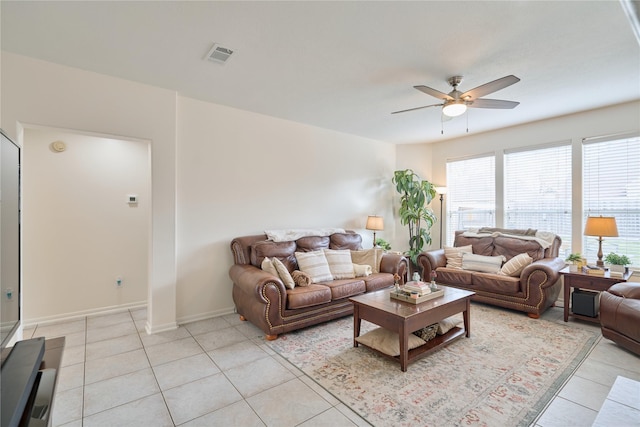 19106 S Rim Trl, Spring, TX 77388 - living area featuring plenty of natural light, ceiling fan, light tile patterned flooring, and visible vents