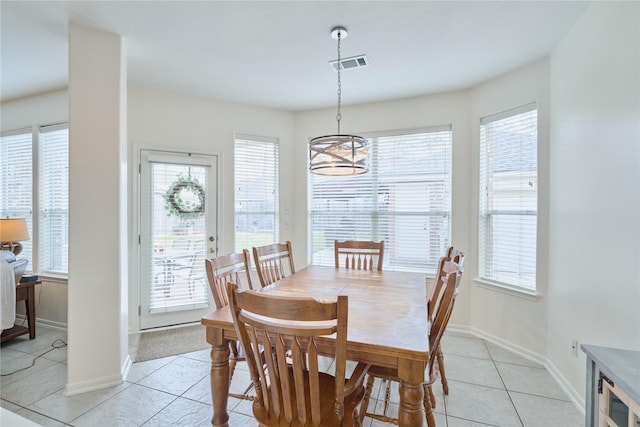 19106 S Rim Trl, Spring, TX 77388 - dining room with visible vents, baseboards, a notable chandelier, and light tile patterned flooring