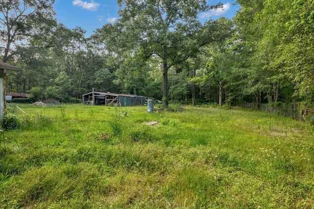 4205 Trent Rd, Huffman, TX 77336 - view of yard with a wooded view