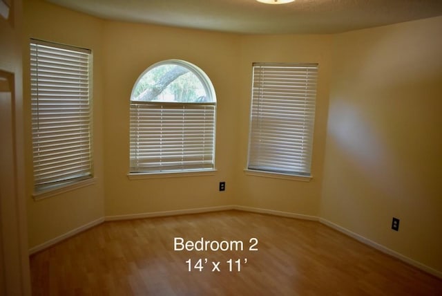 20018 Big Timber Dr, Humble, TX 77346 - unfurnished room with wood finished floors and baseboards