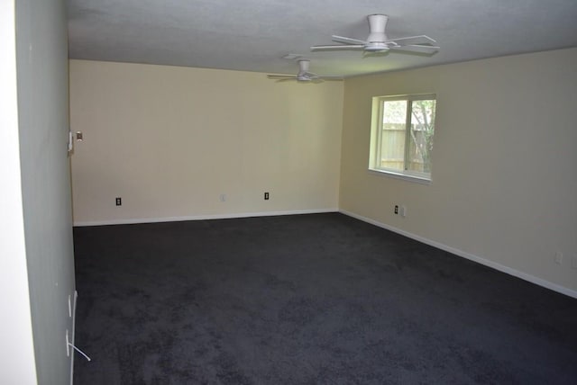 20018 Big Timber Dr, Humble, TX 77346 - spare room with a ceiling fan, baseboards, and dark colored carpet