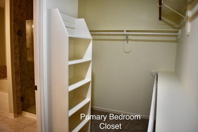 20018 Big Timber Dr, Humble, TX 77346 - spacious closet featuring tile patterned flooring