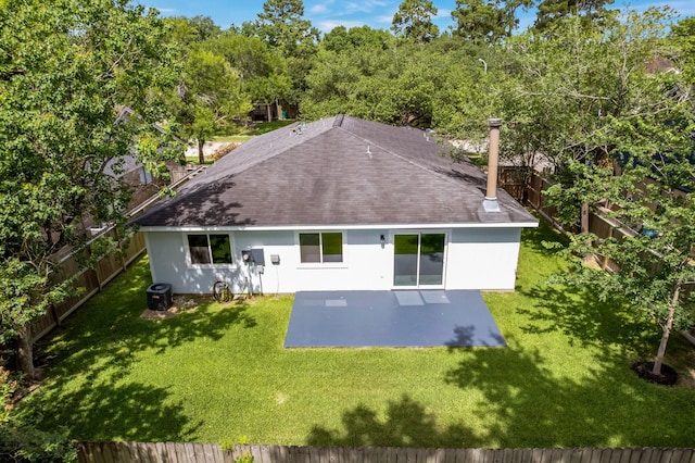 20018 Big Timber Dr, Humble, TX 77346 - rear view of property featuring a shingled roof, a patio, and stucco siding