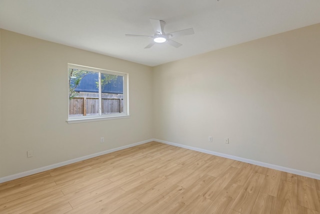 20018 Big Timber Dr, Humble, TX 77346 - unfurnished room featuring a ceiling fan, light wood-type flooring, and baseboards