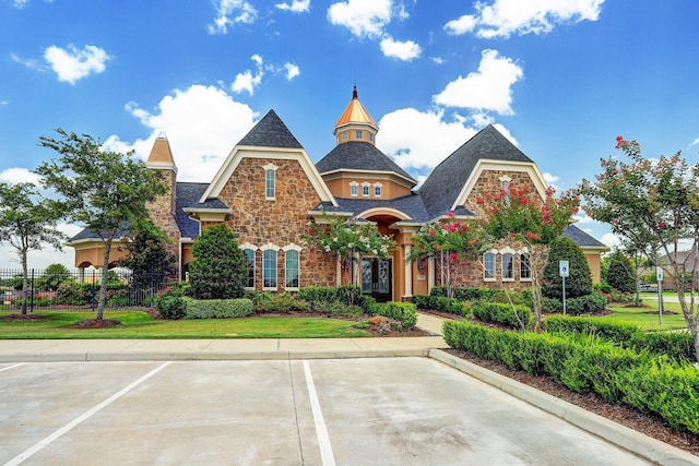 6326 Prince Place Dr, Rosenberg, TX 77471 - view of building exterior featuring fence and uncovered parking