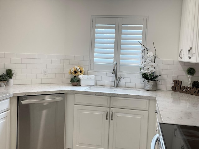 kitchen featuring a sink, dishwasher, electric stove, white cabinetry, and backsplash