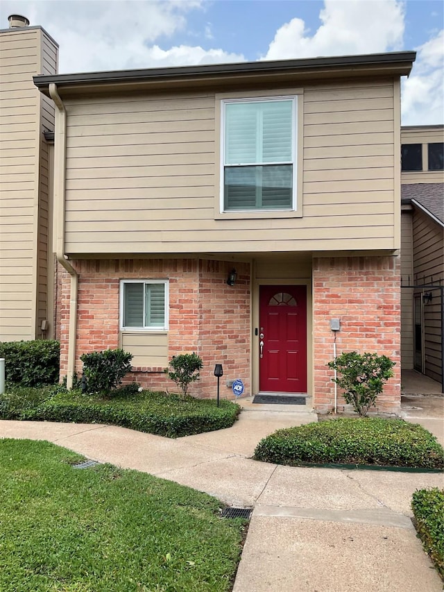 multi unit property with brick siding