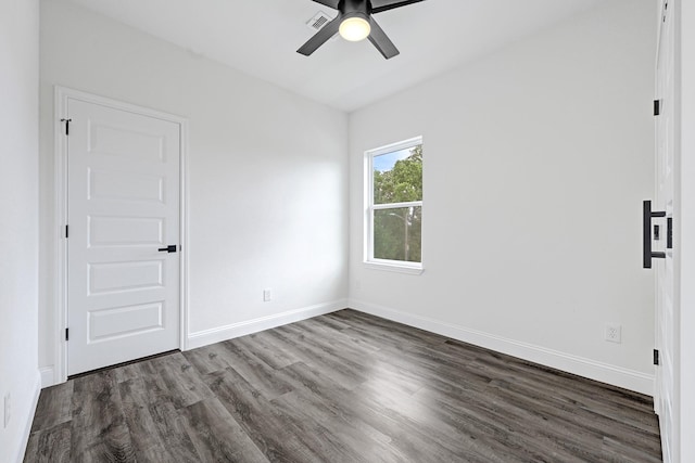 2104 Bringhurst St, Houston, TX 77026 - unfurnished bedroom featuring wood finished floors, baseboards, and ceiling fan