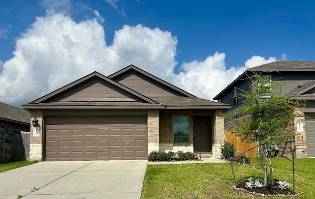 14670 Canyon Pines Ln, New Caney, TX 77357 - view of front facade featuring driveway, an attached garage, and brick siding