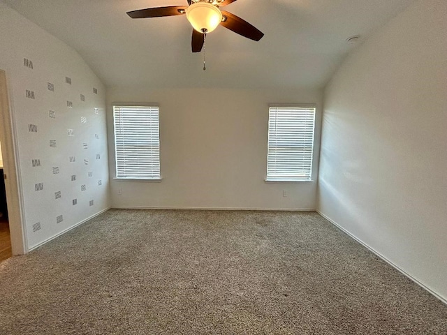 14670 Canyon Pines Ln, New Caney, TX 77357 - carpeted empty room featuring vaulted ceiling, a ceiling fan, and baseboards