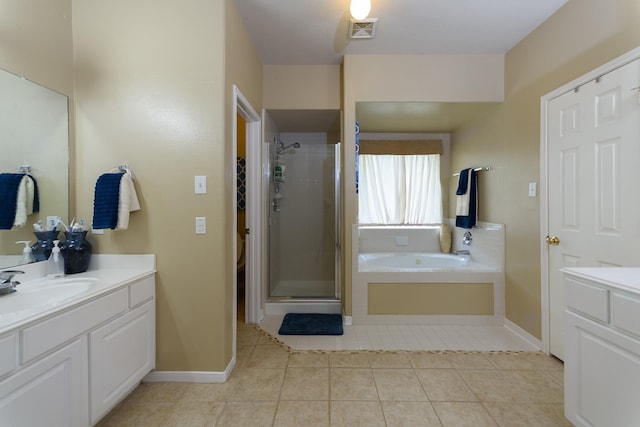 3905 Austin Lake Ct, Pearland, TX 77581 - bathroom with visible vents, a stall shower, and vanity