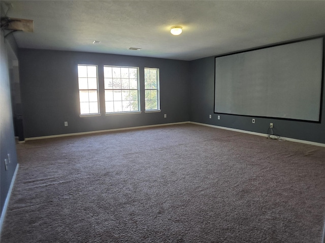 3905 Austin Lake Ct, Pearland, TX 77581 - carpeted home theater room with baseboards and visible vents