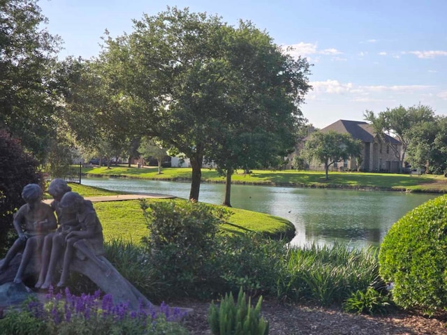 3905 Austin Lake Ct, Pearland, TX 77581 - exterior space featuring a water view and a yard