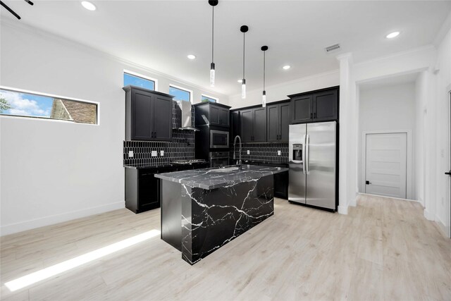3020 Retta St, Houston, TX 77026 - kitchen featuring dark cabinetry, backsplash, and stainless steel appliances