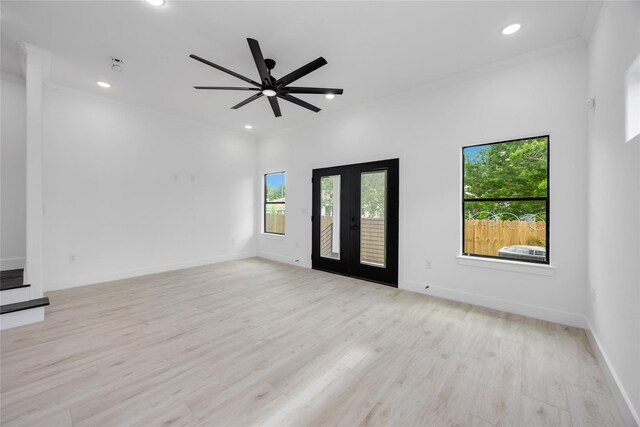 3020 Retta St, Houston, TX 77026 - unfurnished living room featuring ornamental molding, ceiling fan, light wood-type flooring, recessed lighting, and french doors
