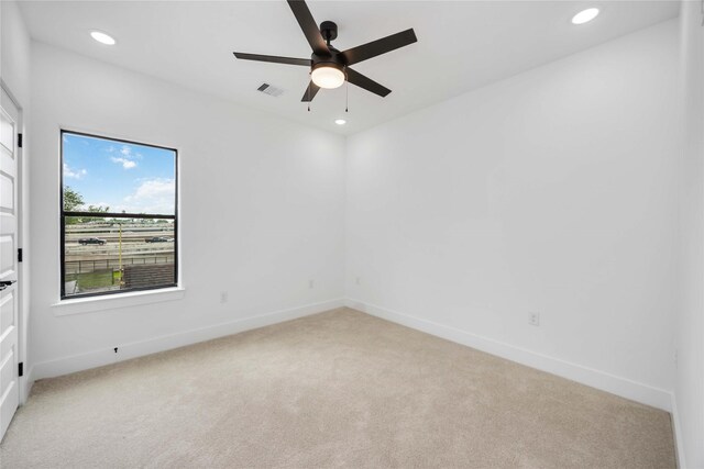 3020 Retta St, Houston, TX 77026 - spare room with visible vents, baseboards, recessed lighting, light colored carpet, and a ceiling fan