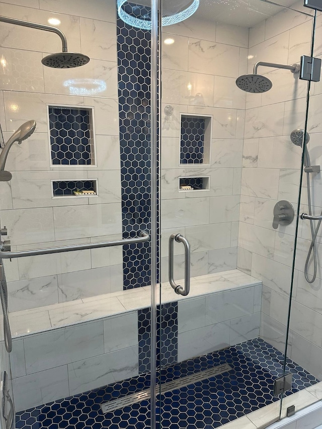 full bath featuring a shower stall