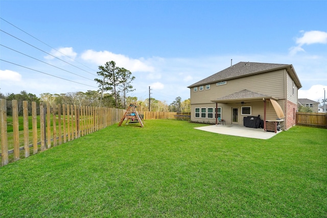 1202 Casal Springs Ct, Crosby, TX 77532 - view of yard featuring a playground, ceiling fan, a patio area, and a fenced backyard