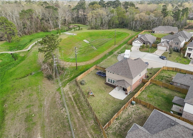 1202 Casal Springs Ct, Crosby, TX 77532 - drone / aerial view with a residential view and a wooded view