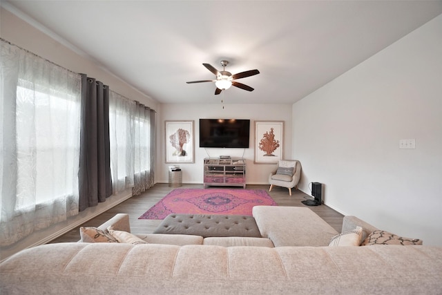 1202 Casal Springs Ct, Crosby, TX 77532 - living area featuring baseboards, ceiling fan, and wood finished floors
