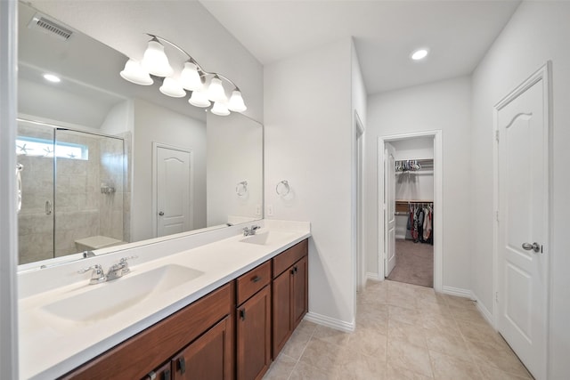 1202 Casal Springs Ct, Crosby, TX 77532 - bathroom with double vanity, visible vents, a sink, and a stall shower