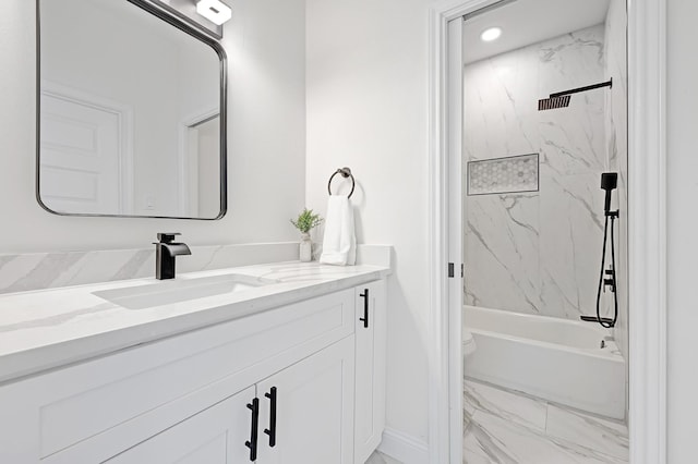 bathroom with marble finish flooring, vanity, shower / bath combination, baseboards, and recessed lighting