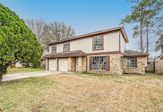 traditional-style house featuring driveway, a front yard, a garage, brick siding, and fence