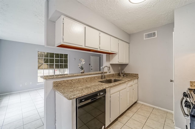kitchen with stainless steel gas range oven, a sink, a textured ceiling, black dishwasher, and visible vents