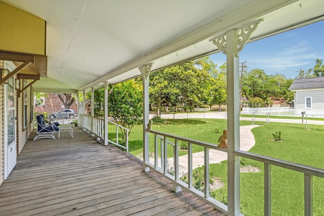 504 S Jackson St, Alvin, TX 77511 - deck with a yard and covered porch