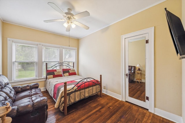 504 S Jackson St, Alvin, TX 77511 - bedroom featuring ornamental molding, baseboards, multiple windows, and wood finished floors