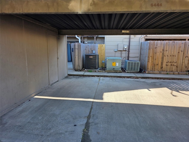 6444 Kentwick Dr Unit 24/13, Houston, TX 77084 - view of patio featuring fence and central AC