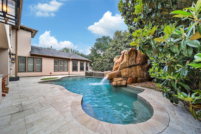 swimming pool featuring a patio