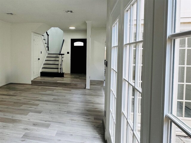 2323 Augusta Dr Unit 43, Houston, TX 77057 - foyer with wood finished floors and stairway