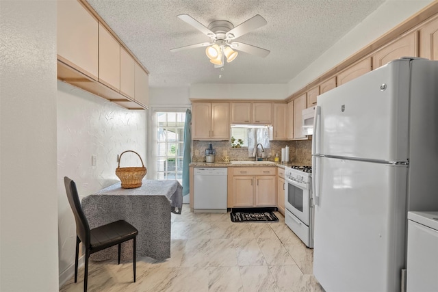 1016 E Tri Oaks Ln Unit 79, Houston, TX 77043 - kitchen with light brown cabinetry, white appliances, a textured ceiling, ceiling fan, and backsplash