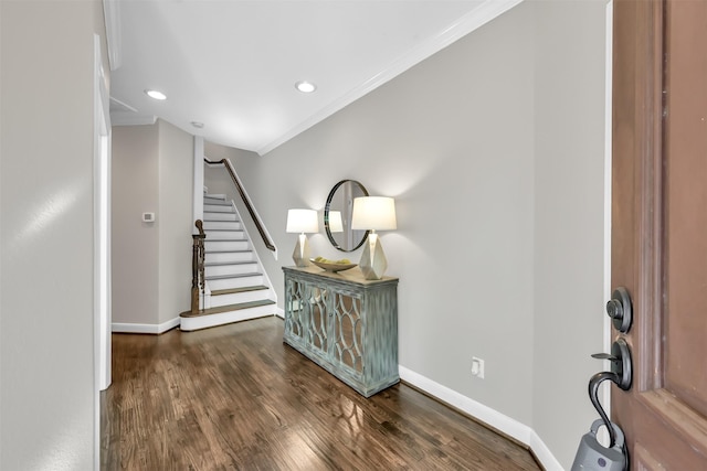 foyer featuring recessed lighting, baseboards, ornamental molding, and wood finished floors