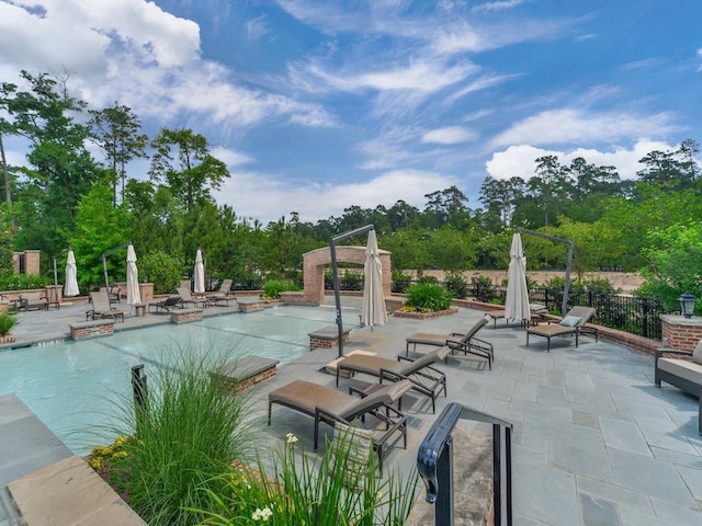 pool with a patio
