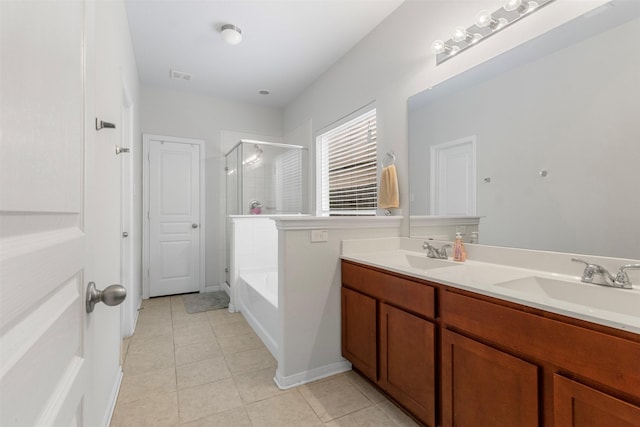 522 Pequin Rd, Crosby, TX 77532 - full bathroom with an enclosed shower, tile patterned floors, visible vents, and a sink