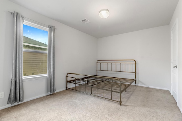 522 Pequin Rd, Crosby, TX 77532 - carpeted bedroom featuring visible vents and baseboards