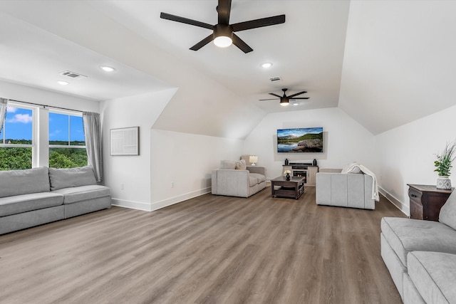 224 Kellog, Fischer, TX 78623 - living area featuring a ceiling fan, baseboards, wood finished floors, recessed lighting, and vaulted ceiling