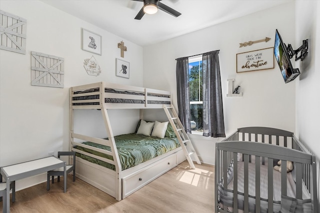 224 Kellog, Fischer, TX 78623 - bedroom with wood finished floors, baseboards, and ceiling fan