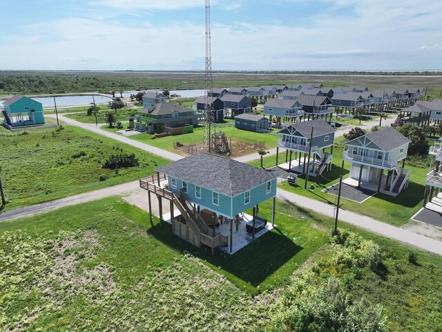 1062 Cedar Ln, Gilchrist, TX 77617 - aerial perspective of suburban area with a nearby body of water