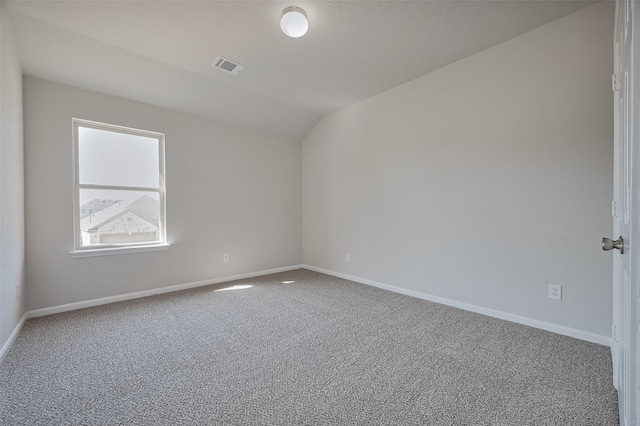 24114 Morrison Ln, Katy, TX 77493 - carpeted empty room with baseboards, lofted ceiling, and visible vents