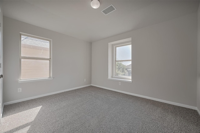 24114 Morrison Ln, Katy, TX 77493 - spare room featuring carpet floors, baseboards, and visible vents
