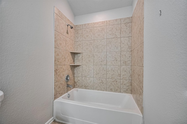 24114 Morrison Ln, Katy, TX 77493 - bathroom with a textured wall and shower / washtub combination