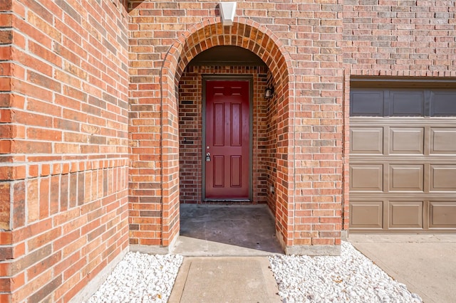 24114 Morrison Ln, Katy, TX 77493 - property entrance featuring a garage and brick siding