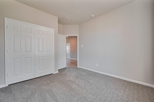 24114 Morrison Ln, Katy, TX 77493 - unfurnished bedroom with carpet floors, baseboards, a closet, and visible vents