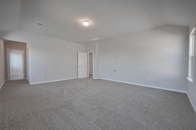 24114 Morrison Ln, Katy, TX 77493 - carpeted empty room with baseboards, vaulted ceiling, and visible vents