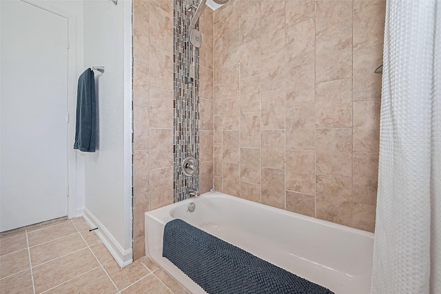 13018 Vernon Rd, Cypress, TX 77429 - full bath with shower / bath combo with shower curtain, tile patterned flooring, and baseboards