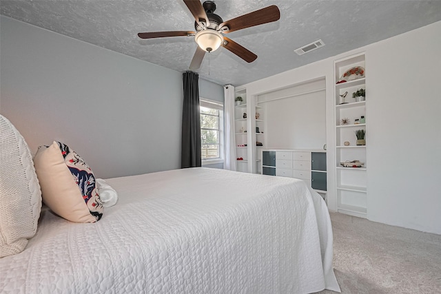13018 Vernon Rd, Cypress, TX 77429 - bedroom with a textured ceiling, carpet flooring, and ceiling fan