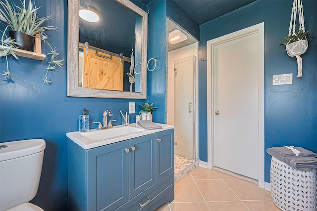 13018 Vernon Rd, Cypress, TX 77429 - full bathroom featuring toilet, tile patterned floors, vanity, and a stall shower